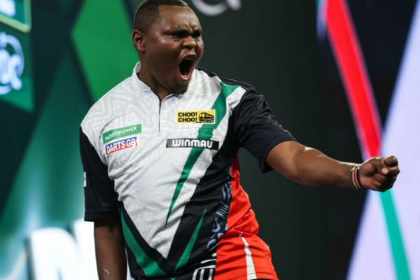 Kenyan Munyua Makes History As Van Gerwen Survives Scare At World Championship
