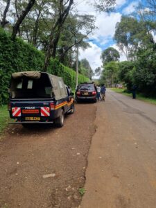 Police at the scene of the abandoned car